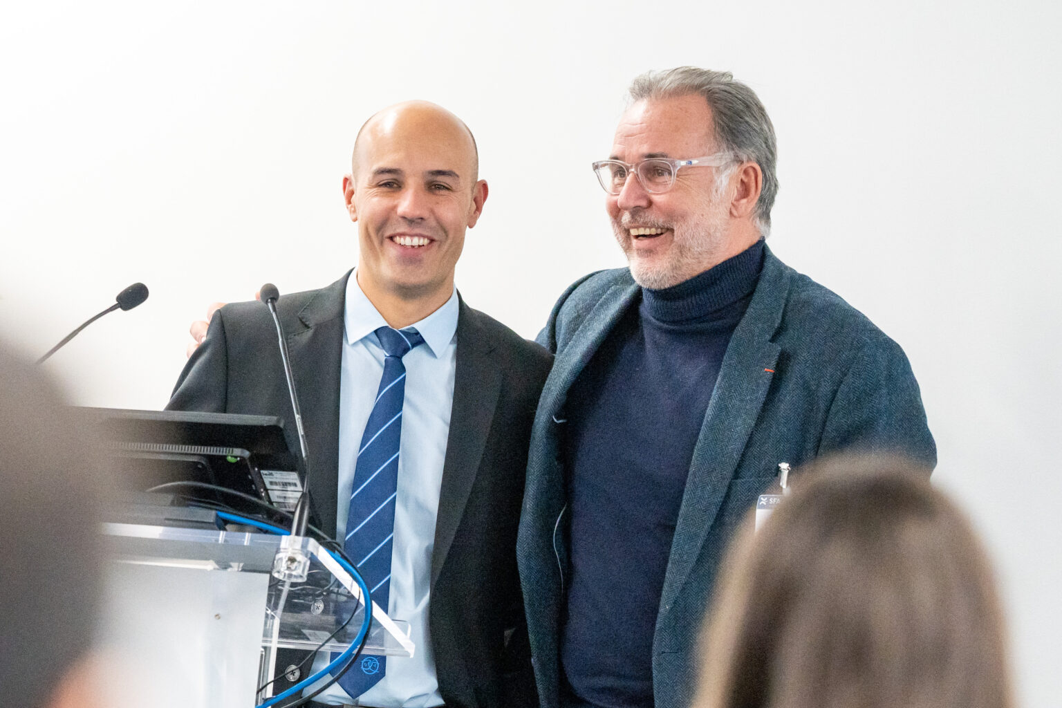 Close-up of athlete amputee's leg, showcasing a prosthesis during exercising in the open outdoor gym.